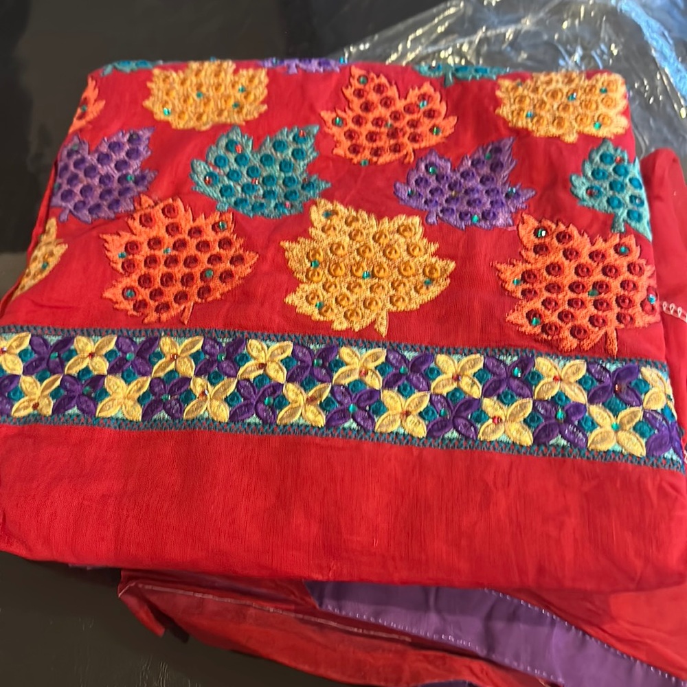 Beautiful red suit with dupatta. Unstitched
